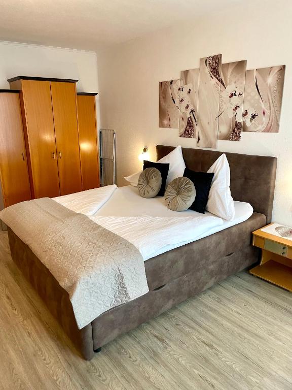 Posteľ alebo postele v izbe v ubytovaní HappyLivingApartments
