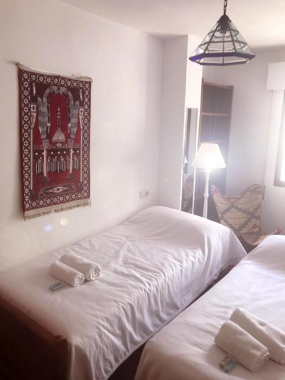 Posteľ alebo postele v izbe v ubytovaní Precioso dúplex céntrico con terraza de 25 m²
