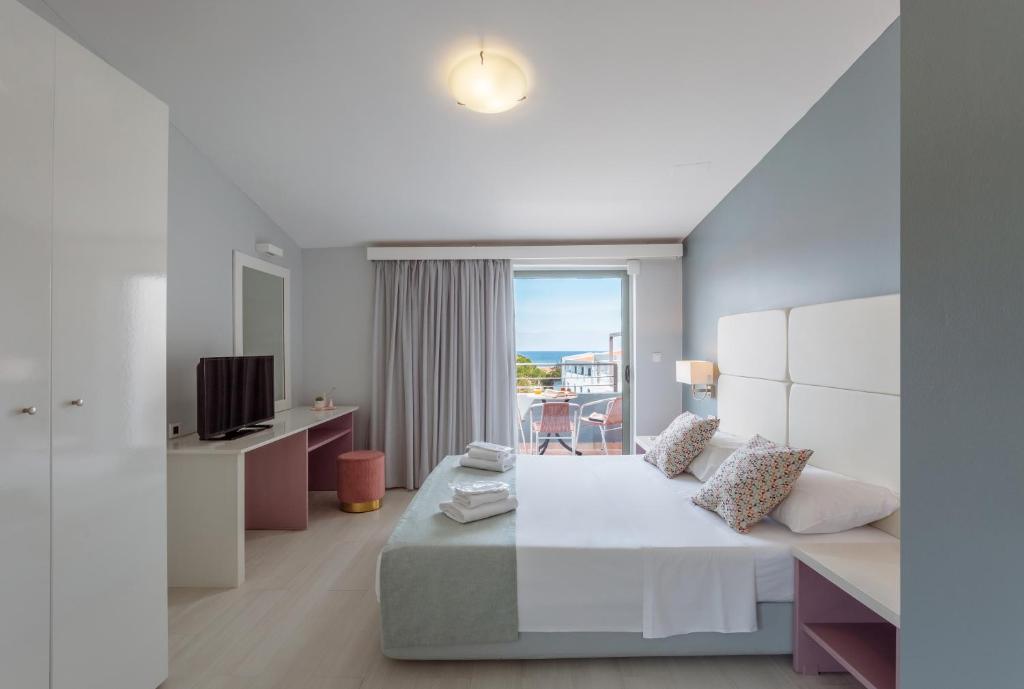 Posteľ alebo postele v izbe v ubytovaní Sunrise Village Hotel - All Inclusive
