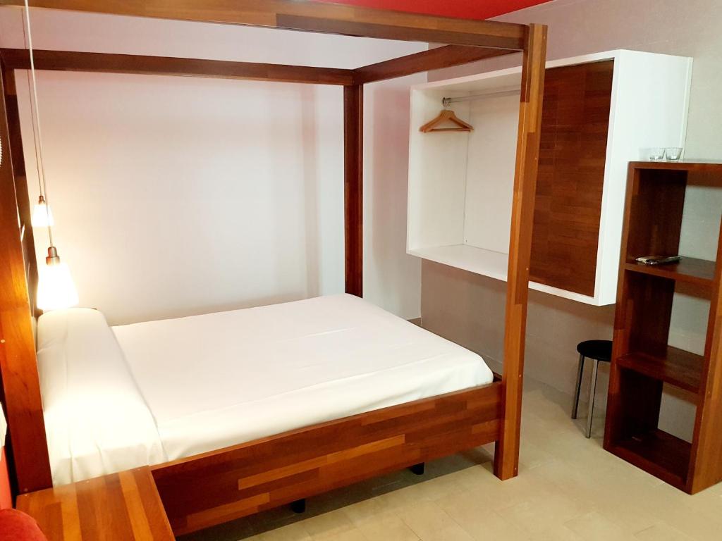 Postel nebo postele na pokoji v ubytování Apartamentos El Arrecife