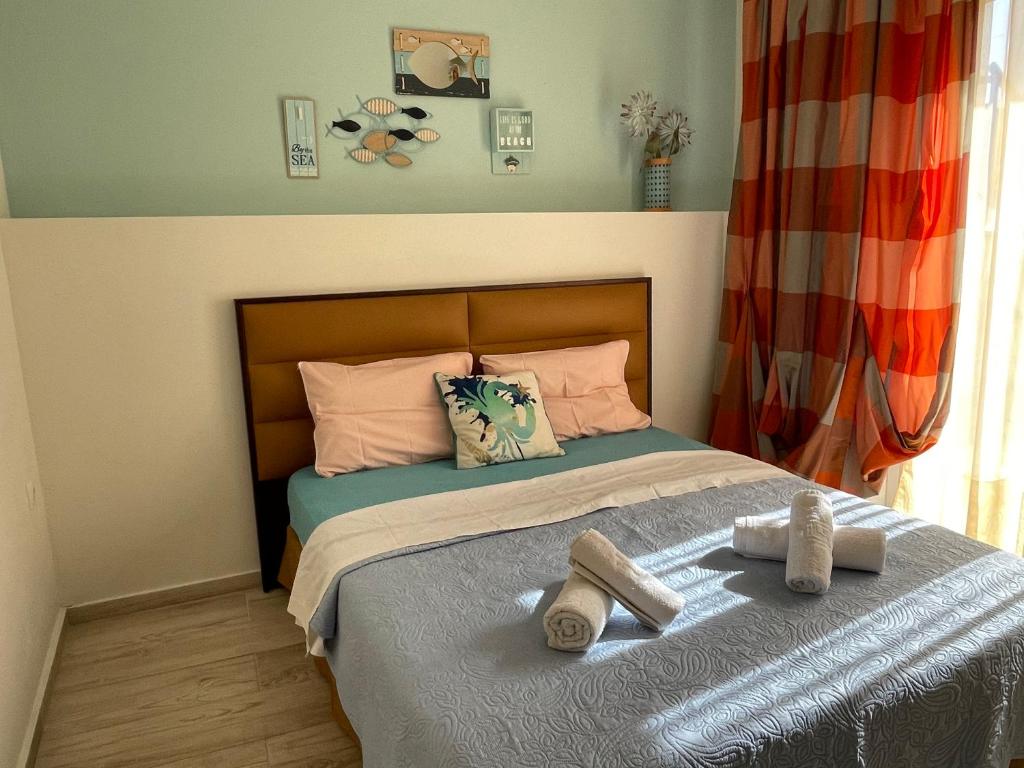 Łóżko lub łóżka w pokoju w obiekcie Central Number 10