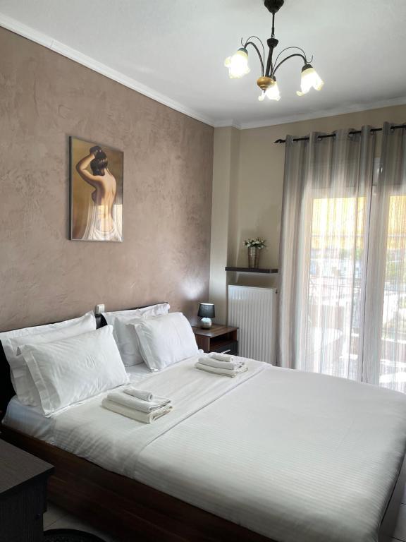 Posteľ alebo postele v izbe v ubytovaní Althea - Christine's House
