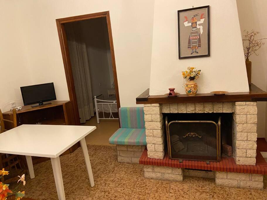 A television and/or entertainment centre at Beautiful apartment by center of Pefkochori Chalkidiki
