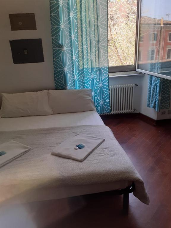 Postel nebo postele na pokoji v ubytování Happy Rome