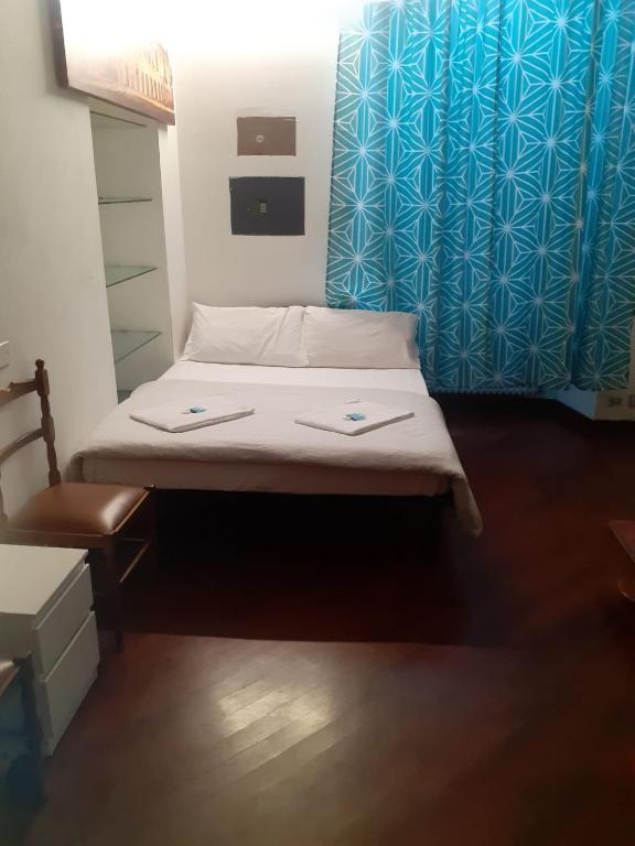 Postel nebo postele na pokoji v ubytování Happy Rome