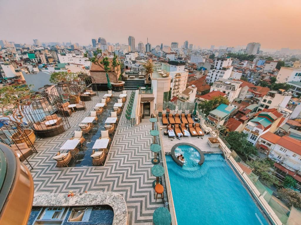 an aerial view of a resort with a swimming pool at Peridot Grand Luxury Boutique Hotel in Hanoi
