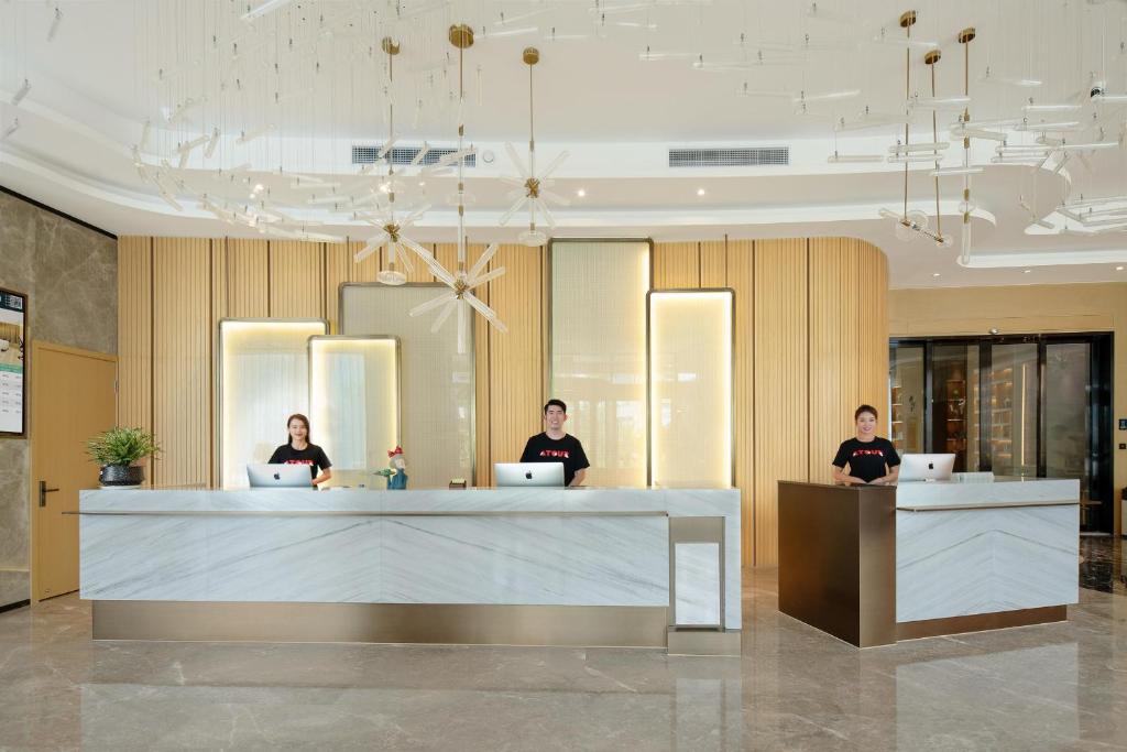 Členové personálu v ubytování Atour Hotel Nanning Wuxiang Headquarter Base