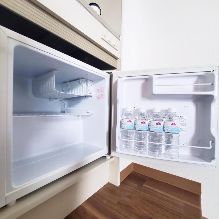 Kuchyň nebo kuchyňský kout v ubytování Rooms