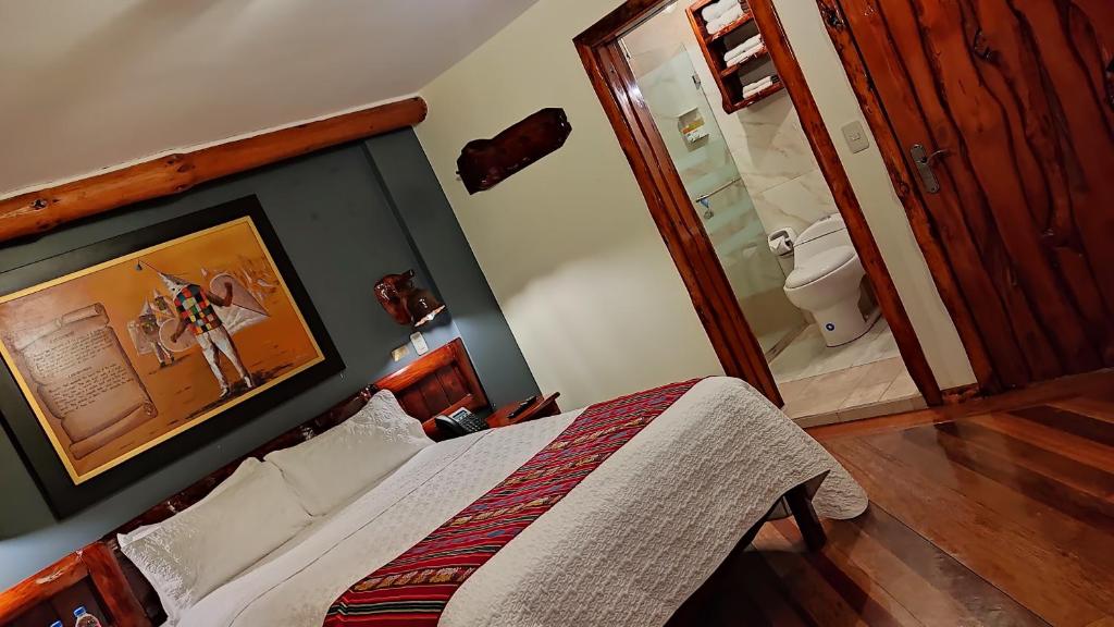 Postel nebo postele na pokoji v ubytování Hotel Maderanegra By Huasicama