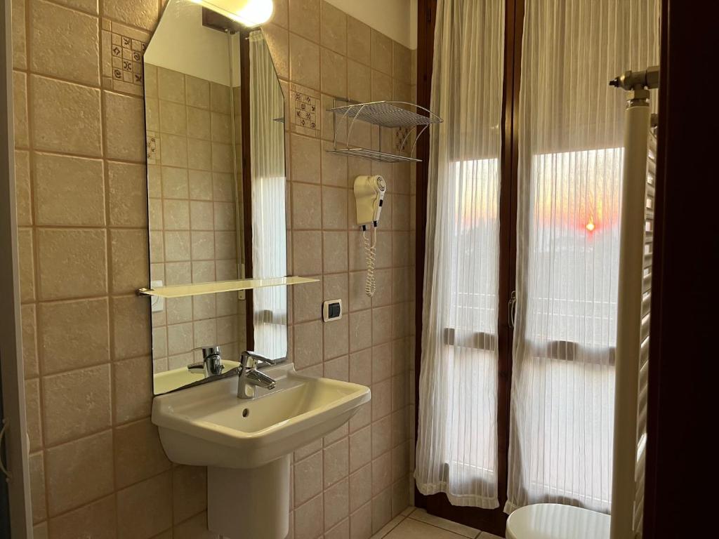 Koupelna v ubytování Hotel Renata