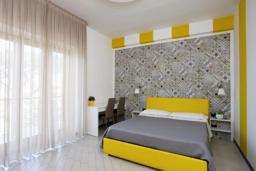 Postel nebo postele na pokoji v ubytování Guest House Le Tre Isole Sorrento