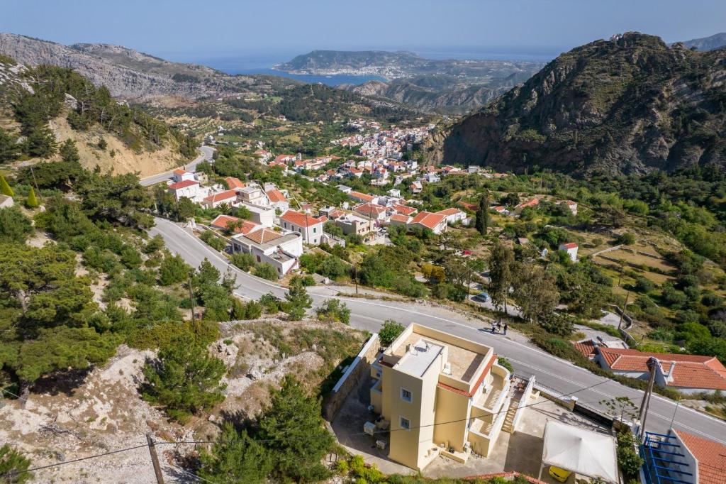 an aerial view of a town in the mountains at Karpathos View Villa in Karpathos
