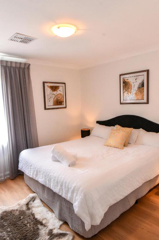 Postel nebo postele na pokoji v ubytování Ganesha Wellness Spa