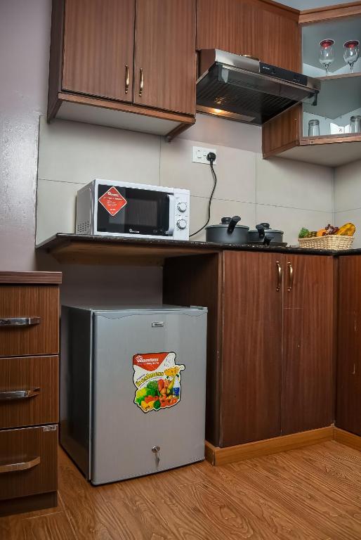 Kuchyň nebo kuchyňský kout v ubytování Ngong Hills Hotel