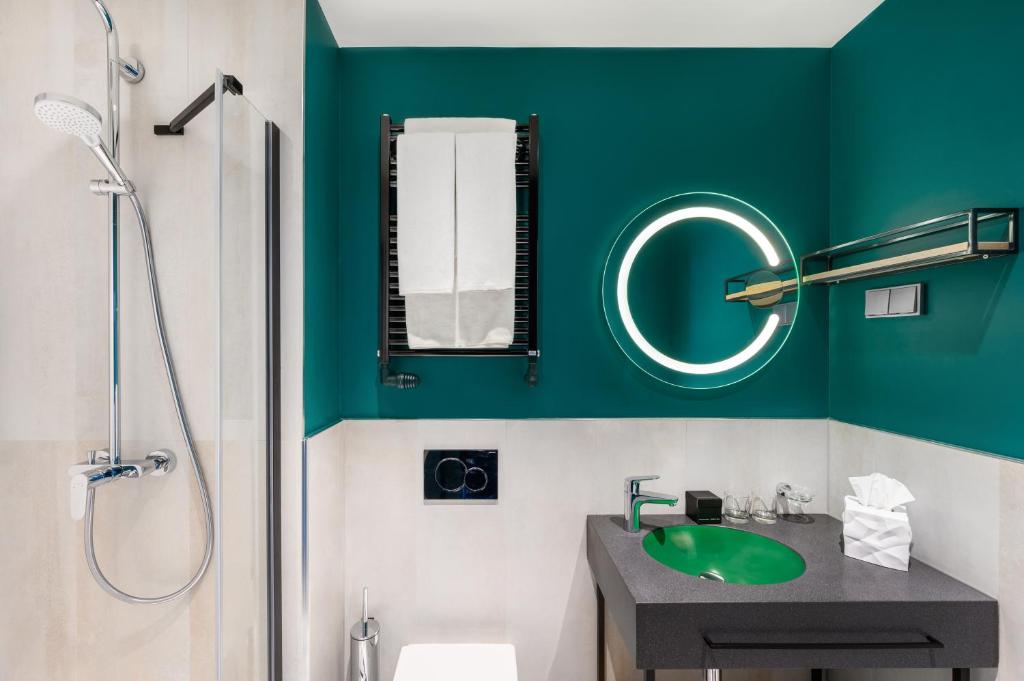 Kúpeľňa v ubytovaní Hotel Oktogon Haggenmacher by Continental Group