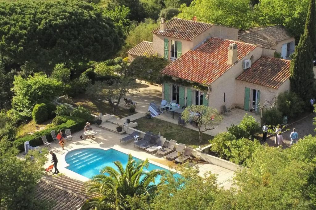 an aerial view of a house with a swimming pool at Villa with 5 Bedrooms and Private Pool in Grimaud