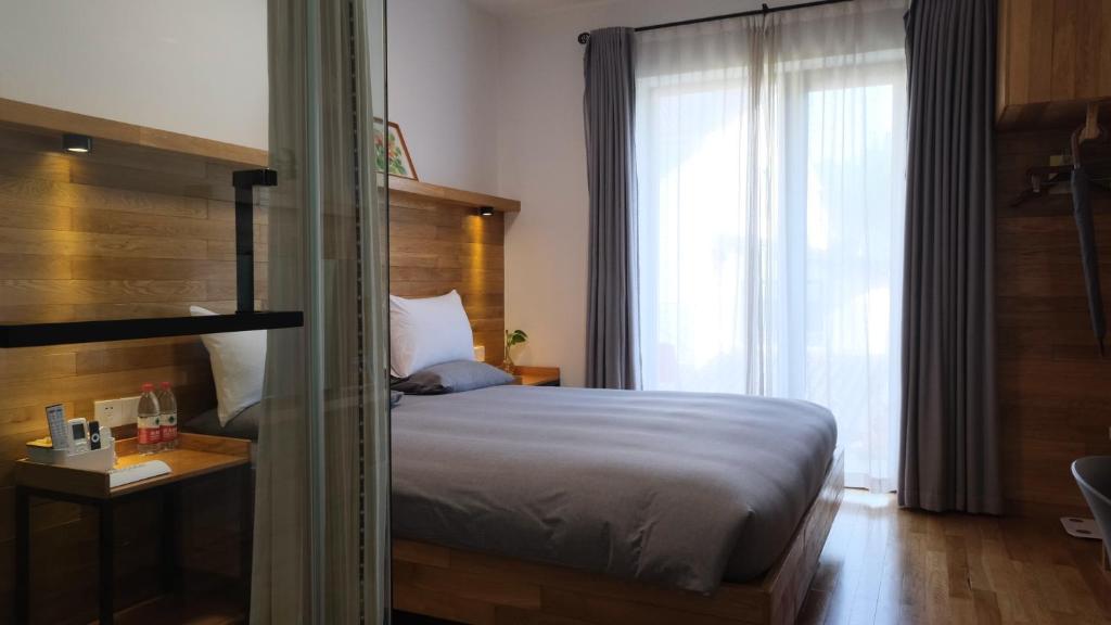 Postel nebo postele na pokoji v ubytování Rock&Wood Cozy House