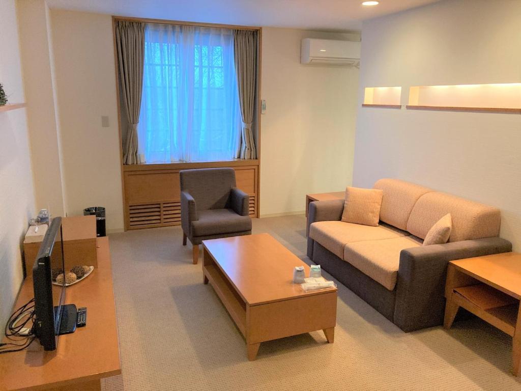 Posezení v ubytování Tabist Hotel Colosseum Inn Tateshina