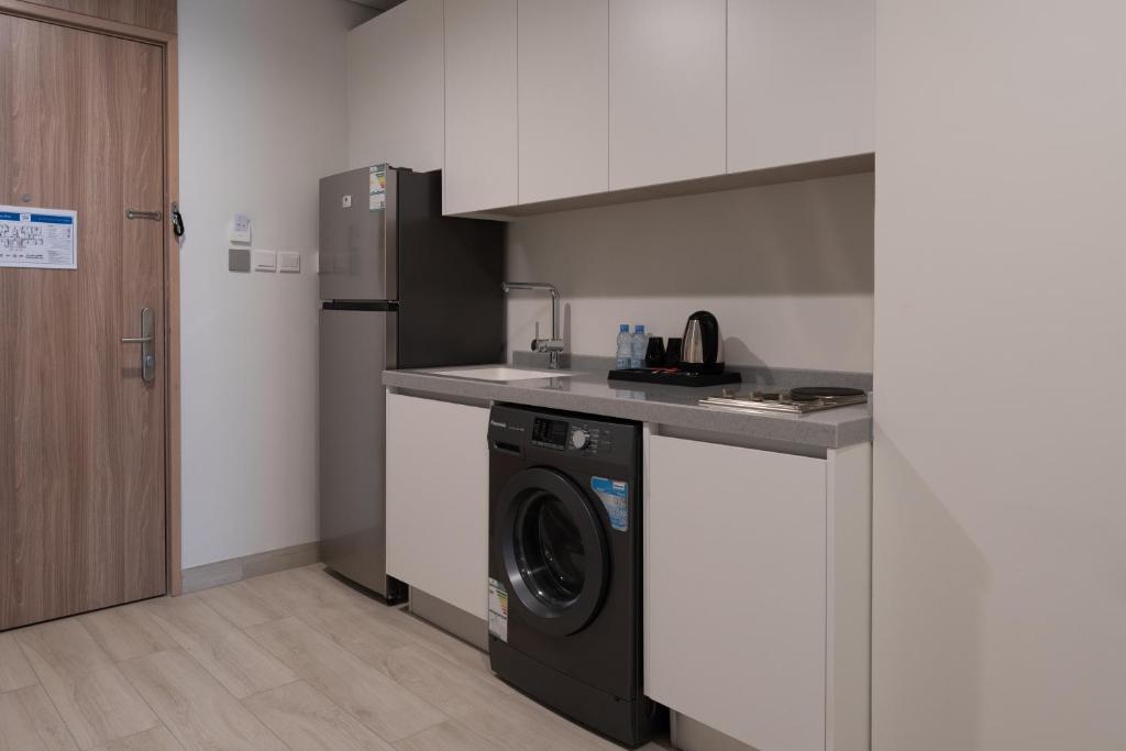 Kuchyň nebo kuchyňský kout v ubytování Mirot Hotel