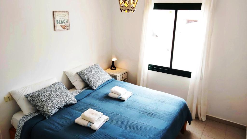 Postel nebo postele na pokoji v ubytování Apartment Vincent, cozy and sunny over the rooftops