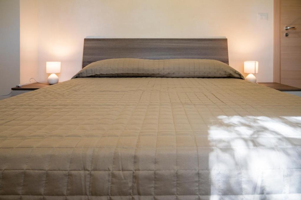 A bed or beds in a room at La Casa del Gelsomino tra Noto e Mare