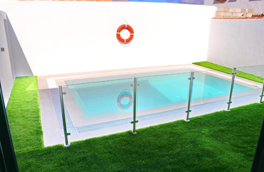 Bazén v ubytování Casa con piscina de agua salada I nebo v jeho okolí