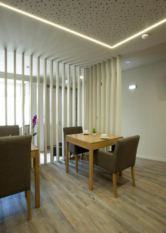 Posezení v ubytování Rua Grande Hotel