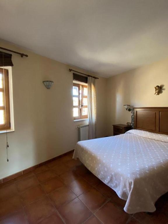 Postel nebo postele na pokoji v ubytování Casa rural osvilares