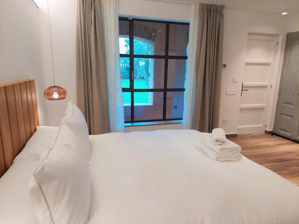Posteľ alebo postele v izbe v ubytovaní HOTEL MAS ARET