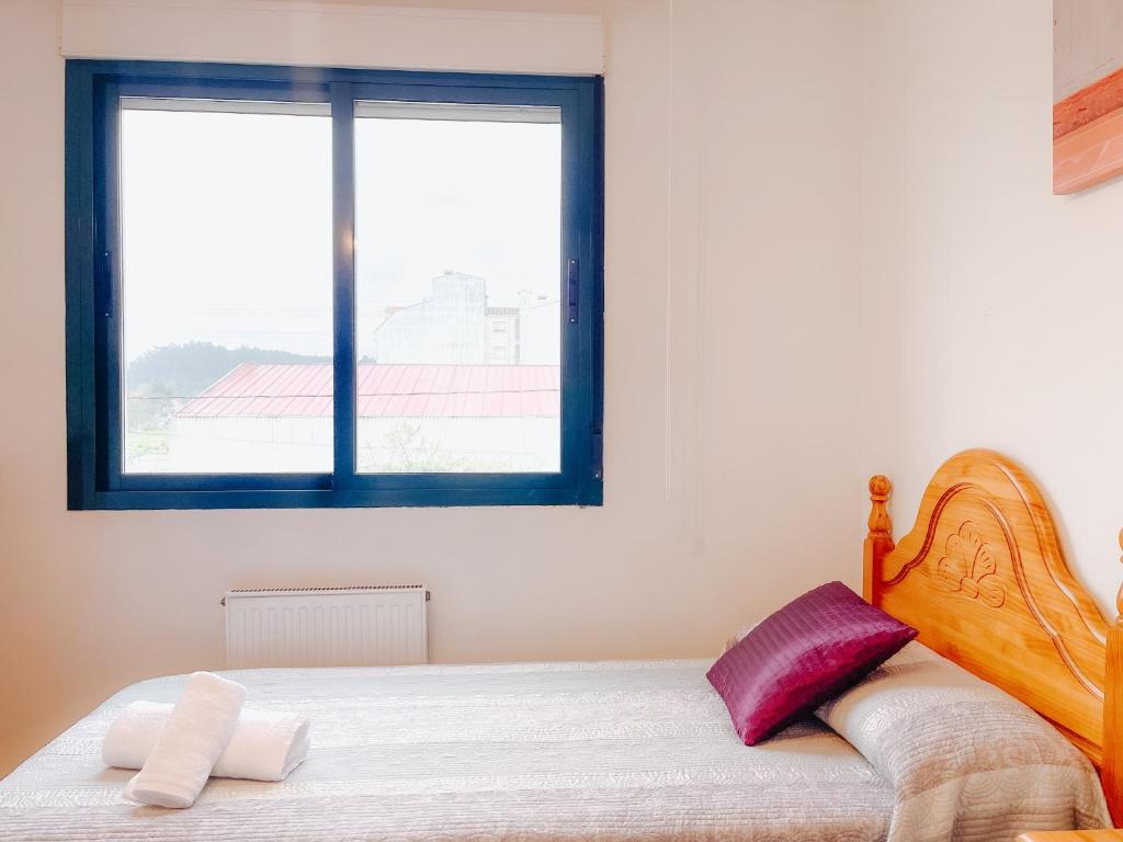 A bed or beds in a room at Sarnadela