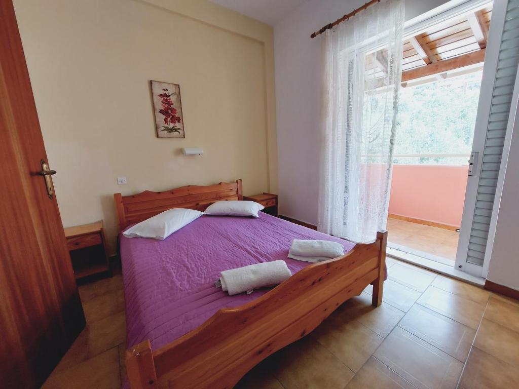 A bed or beds in a room at VILLA ELENA