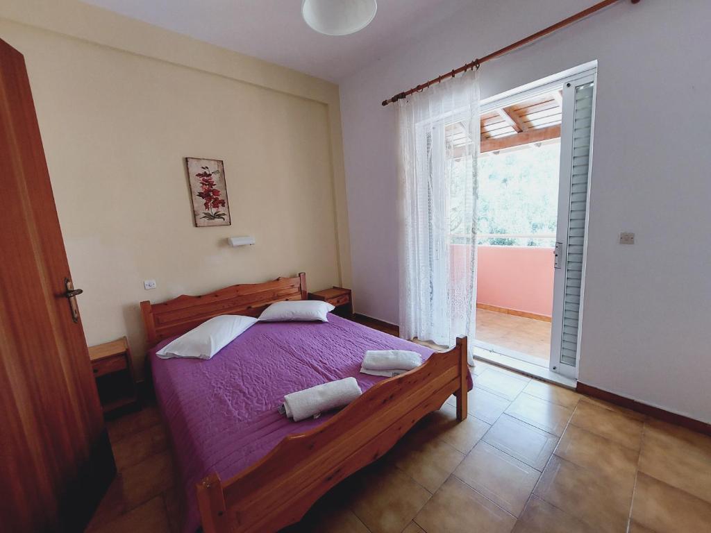 A bed or beds in a room at VILLA ELENA