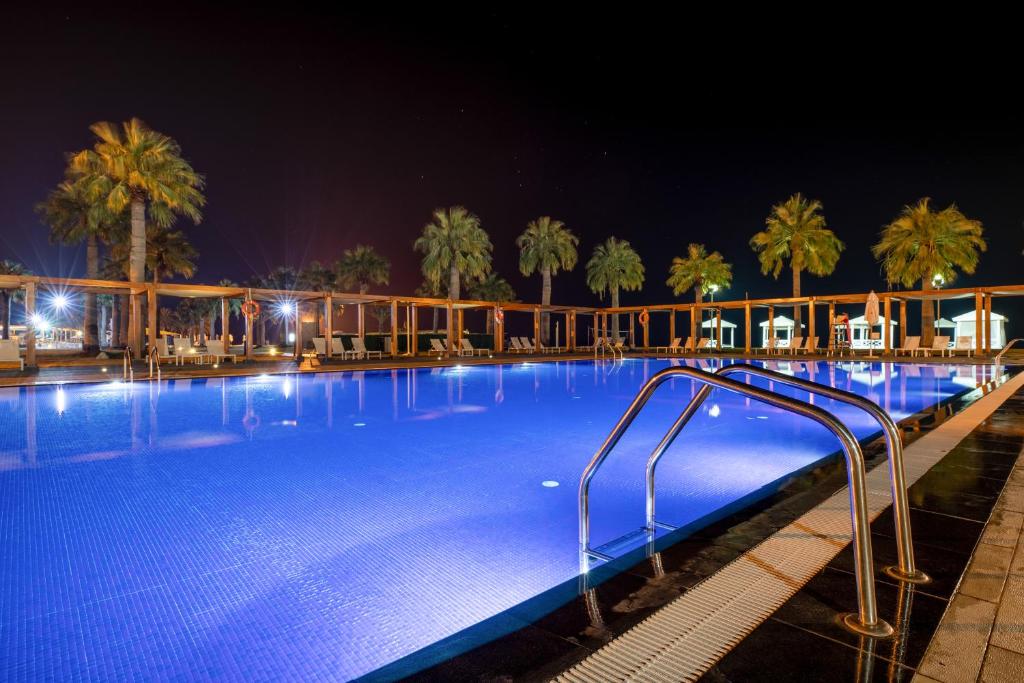Bazén v ubytování Sealine Beach, a Murwab Resort nebo v jeho okolí