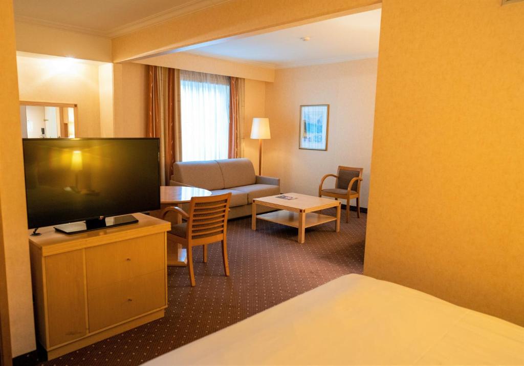 
Premium King Room with Sofa Bed
