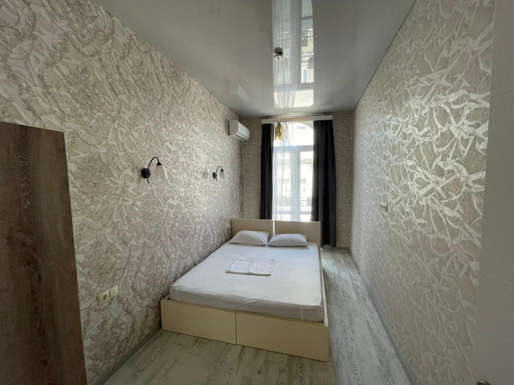 Кровать или кровати в номере Центр города Батуми Apartment Rustaveli 13