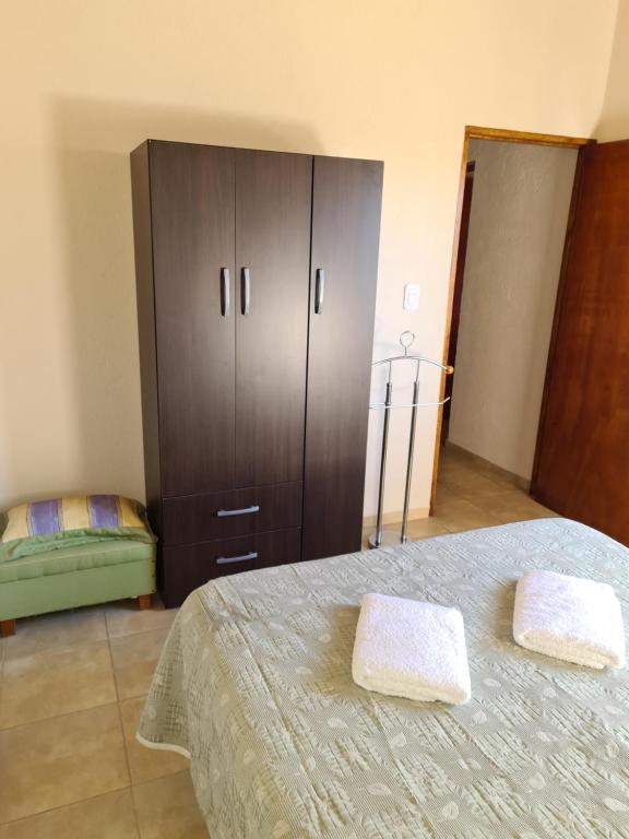 Postel nebo postele na pokoji v ubytování CASA TUNUYÁN