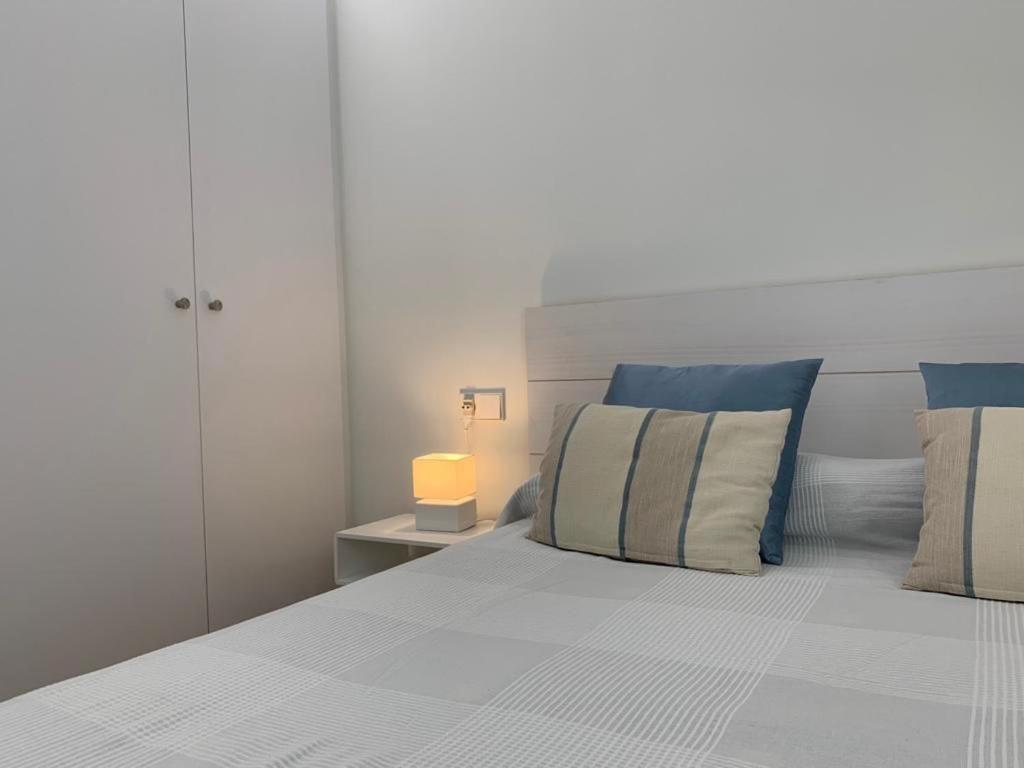 Postel nebo postele na pokoji v ubytování Apartamento Botánico, Centro de Granada