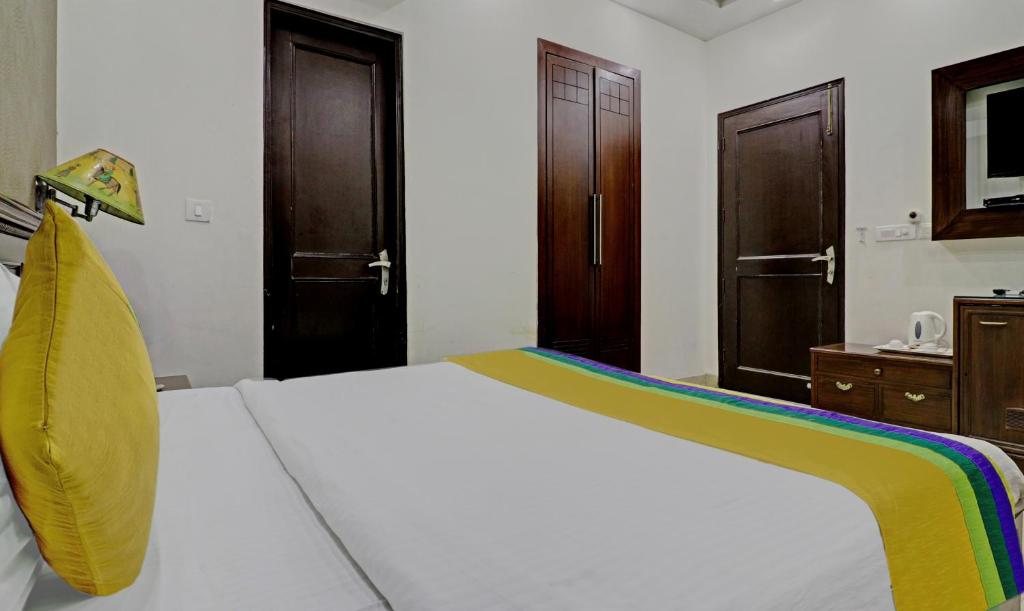 Postel nebo postele na pokoji v ubytování Itsy Hotels Hamlets Stay