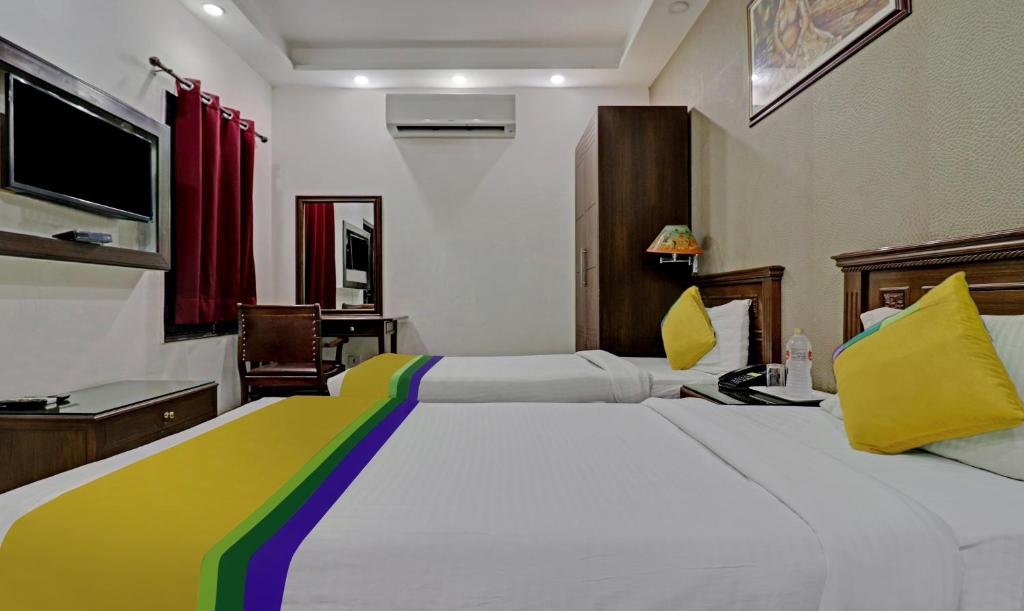 Postel nebo postele na pokoji v ubytování Itsy Hotels Hamlets Stay