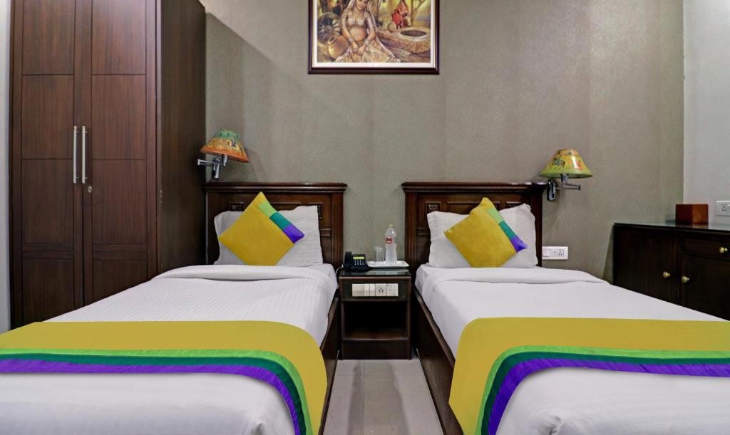 Postel nebo postele na pokoji v ubytování Itsy Hotels Hamlets Stay