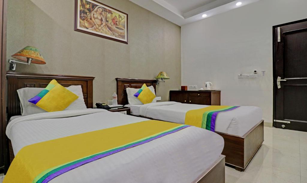 Postel nebo postele na pokoji v ubytování Itsy Hotels Hamlets Stay