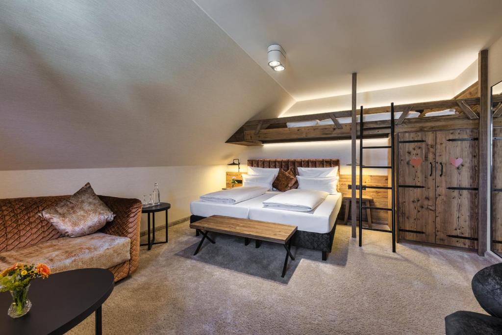 Postel nebo postele na pokoji v ubytování Hotel Schäfflerwirt