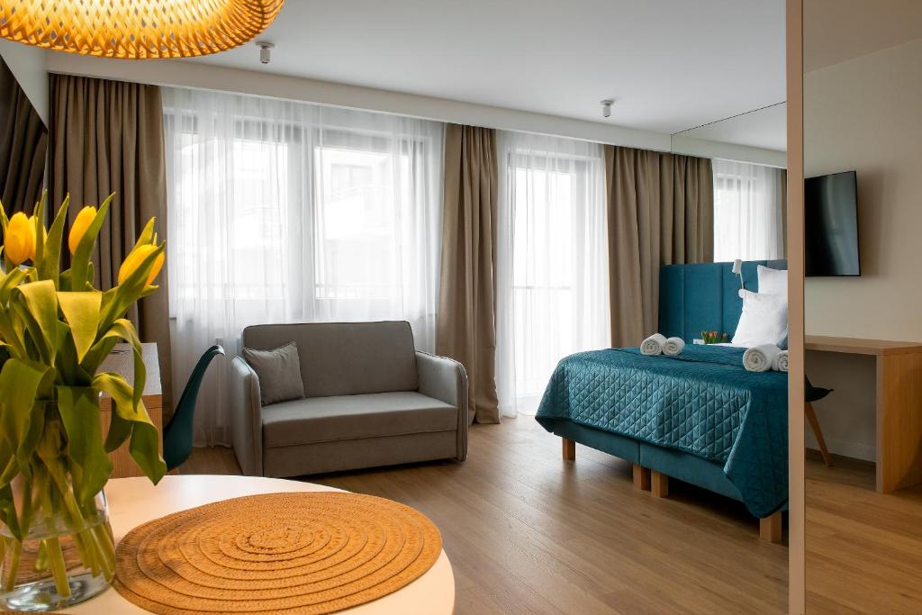 Posteľ alebo postele v izbe v ubytovaní InPoint Apartments G11 near Old Town & Kazimierz District & Parking Option