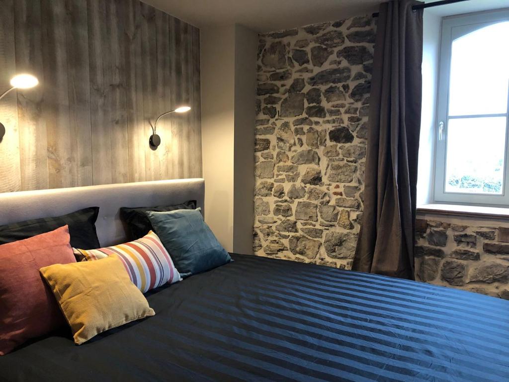 Postel nebo postele na pokoji v ubytování La Tannerie De Durbuy B&B