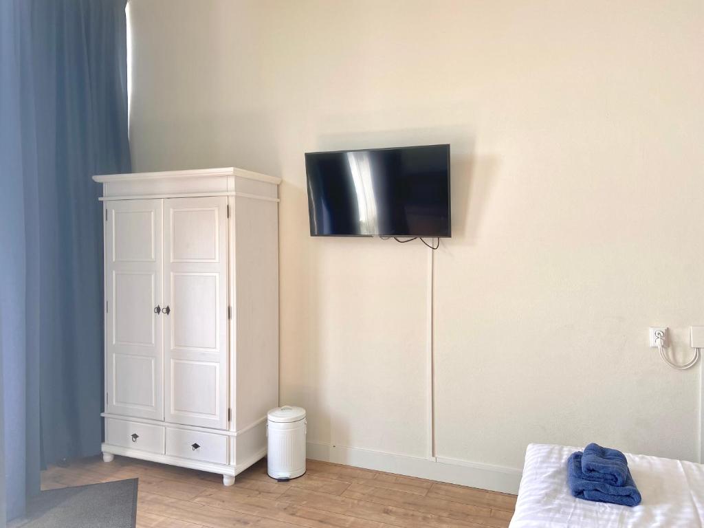 TV a/nebo společenská místnost v ubytování Bed & Ontbijt Haddock