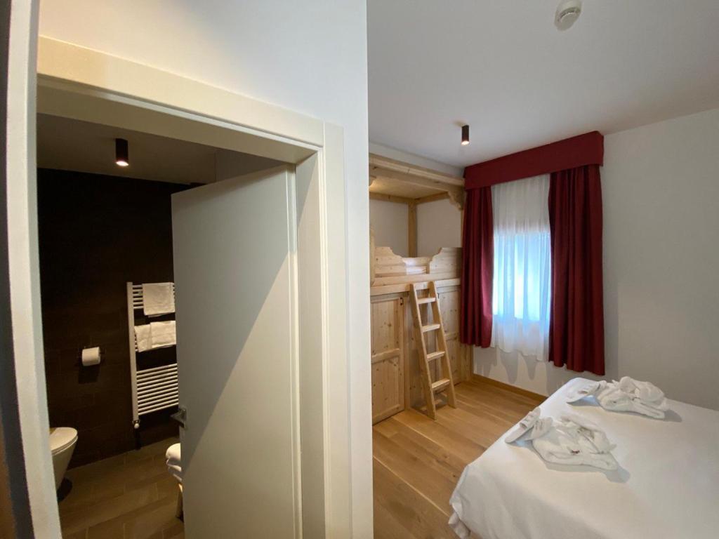 Postel nebo postele na pokoji v ubytování Grand Hotel Miramonti