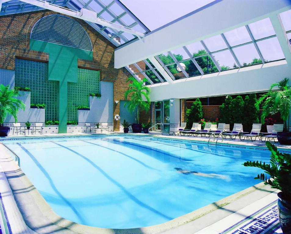 a large swimming pool in a large building at The Royal Sonesta Boston in Cambridge