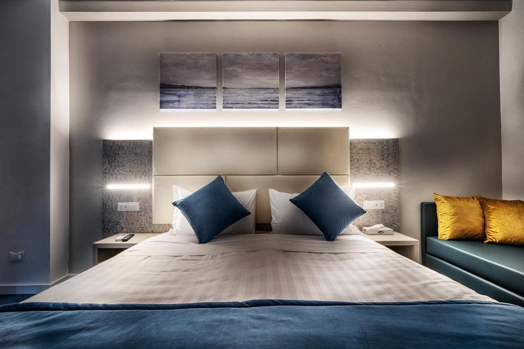 Posteľ alebo postele v izbe v ubytovaní Suite Blue Style