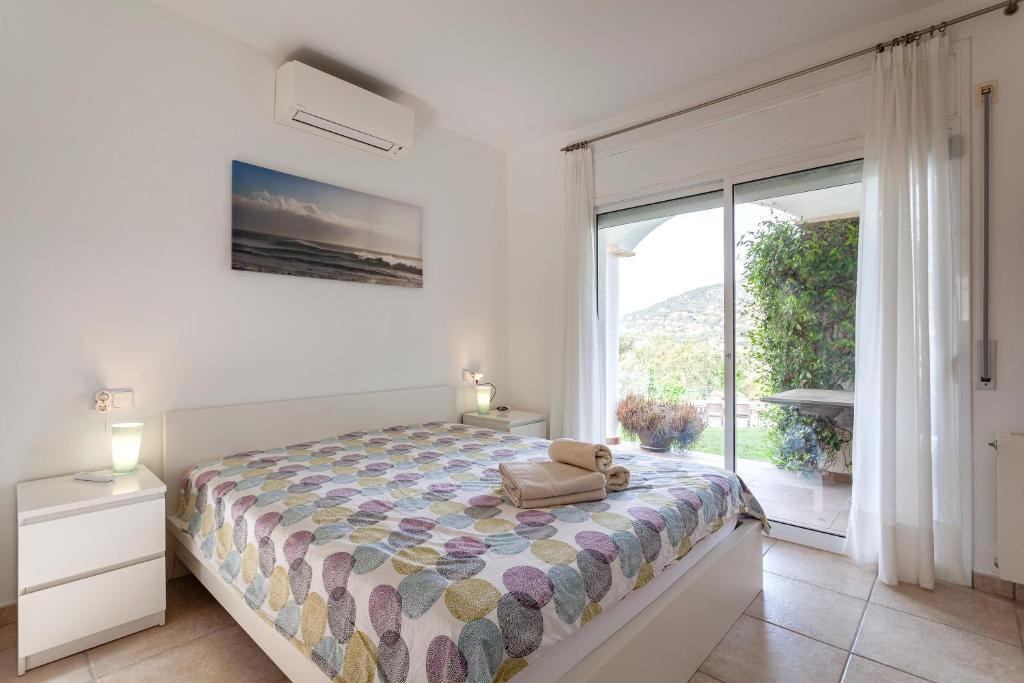 Postel nebo postele na pokoji v ubytování Villa Blanca