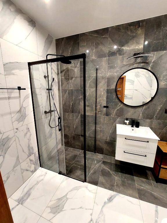 Kúpeľňa v ubytovaní Apartament Komfort 17